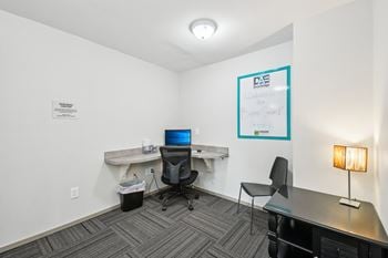 Community clubhouse with coworking lounge at drawbridge apartments in harrison township, mi.